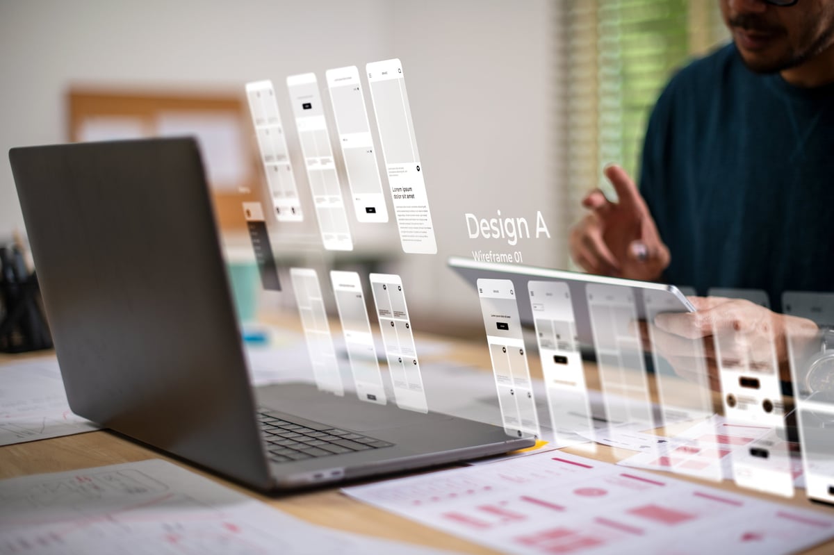 Designer building a website prototype with a holographic interface